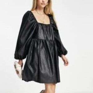 ASOS black faux leather babydoll mini dress with bubble sleeves.  Sz US 6
